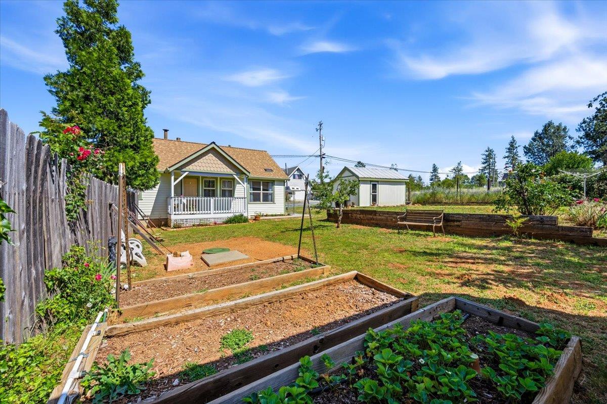 232 Upper Slate Creek Road Grass Valley, CA 95945 - Photo 36 of 48 a view of an house with swimming pool and yard