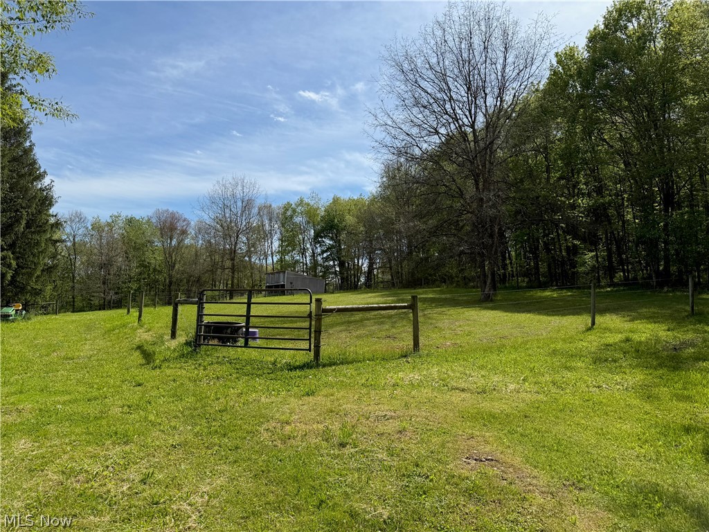 11811 Gaston Road Rogers, OH 44455 - Photo 20 of 38 You've got several acres of usable space, pole barns, and a Quonset Hut (currently used for recreation). Take advantage of the room to play, and play!!