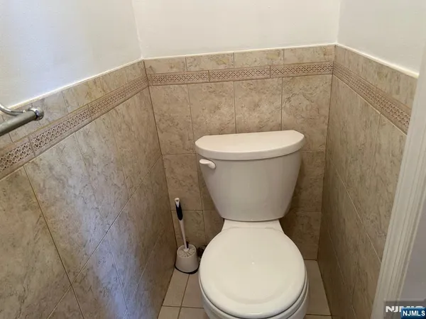 a bathroom with a toilet and a sink