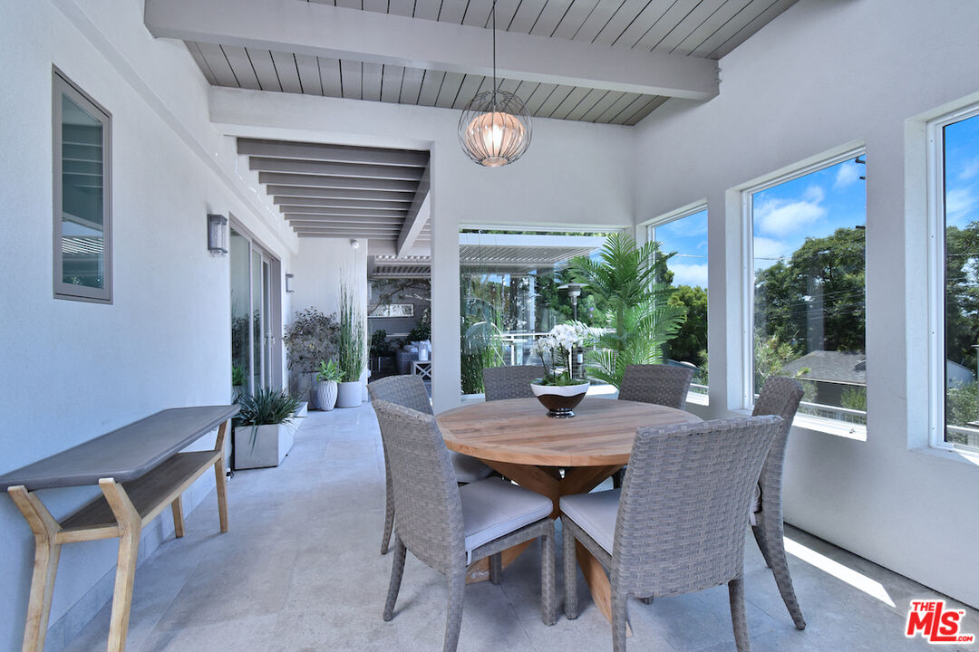 922 Berkeley Street Santa Monica, CA 90403 - Photo 27 of 33 a view of a dining room with furniture window and outside view