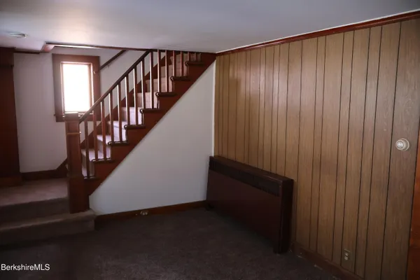 a view of entryway with stairs