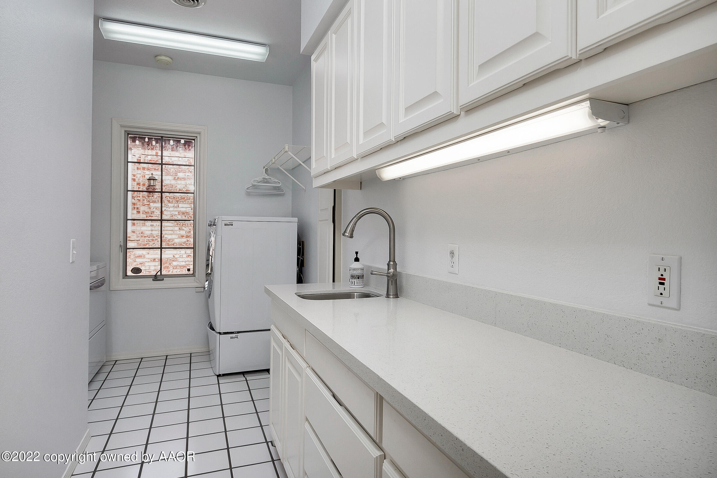 2 Snead Lane Amarillo, TX 79124 - Photo 40 of 76 a kitchen with a sink cabinets and window