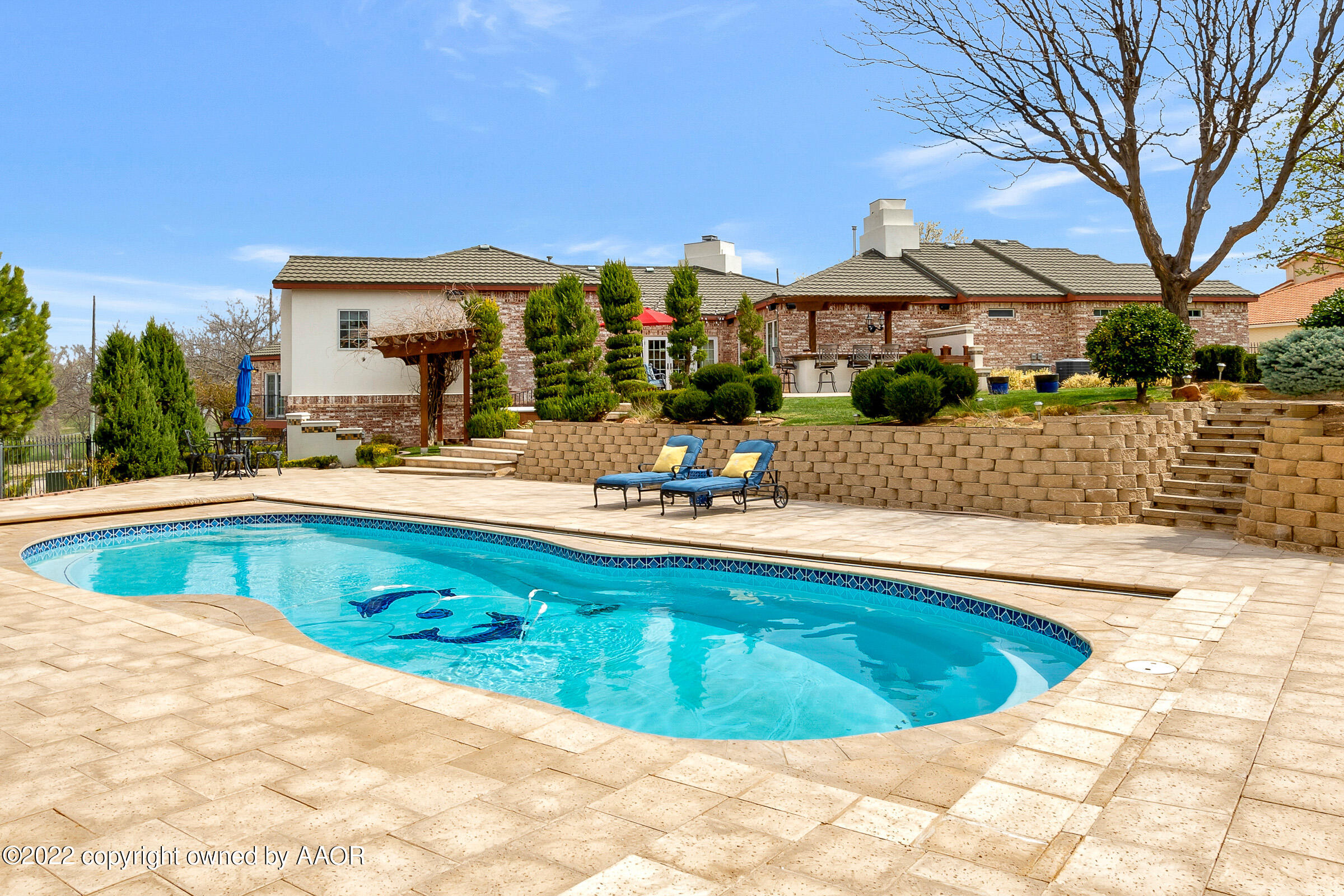 2 Snead Lane Amarillo, TX 79124 - Photo 51 of 76 a view of swimming pool with outdoor seating and house in the background