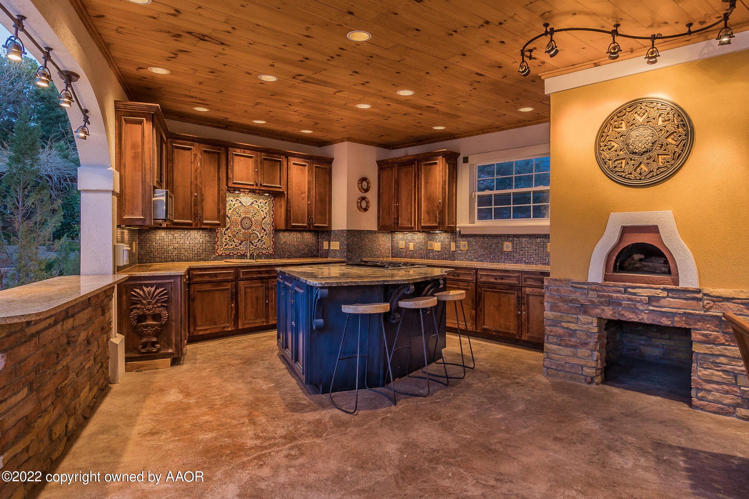 2 Snead Lane Amarillo, TX 79124 - Photo 72 of 76 a kitchen with kitchen island granite countertop a stove a sink and a refrigerator