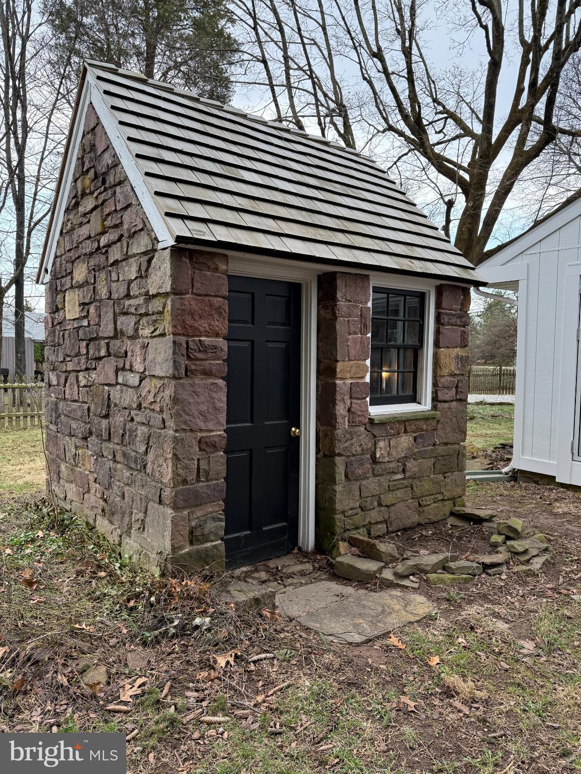 209 Morris Road Lansdale, PA 19446 - Photo 41 of 46 Charming stone shed nestled in nature.