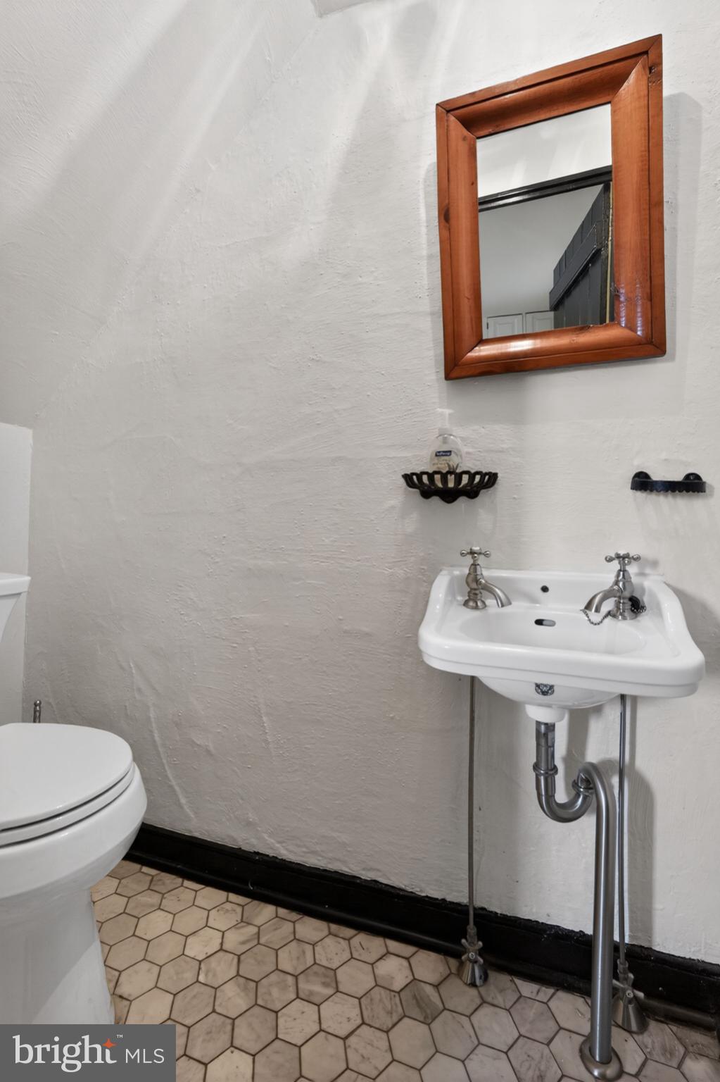 209 Morris Road Lansdale, PA 19446 - Photo 10 of 46 Charming half-bath with vintage appeal.