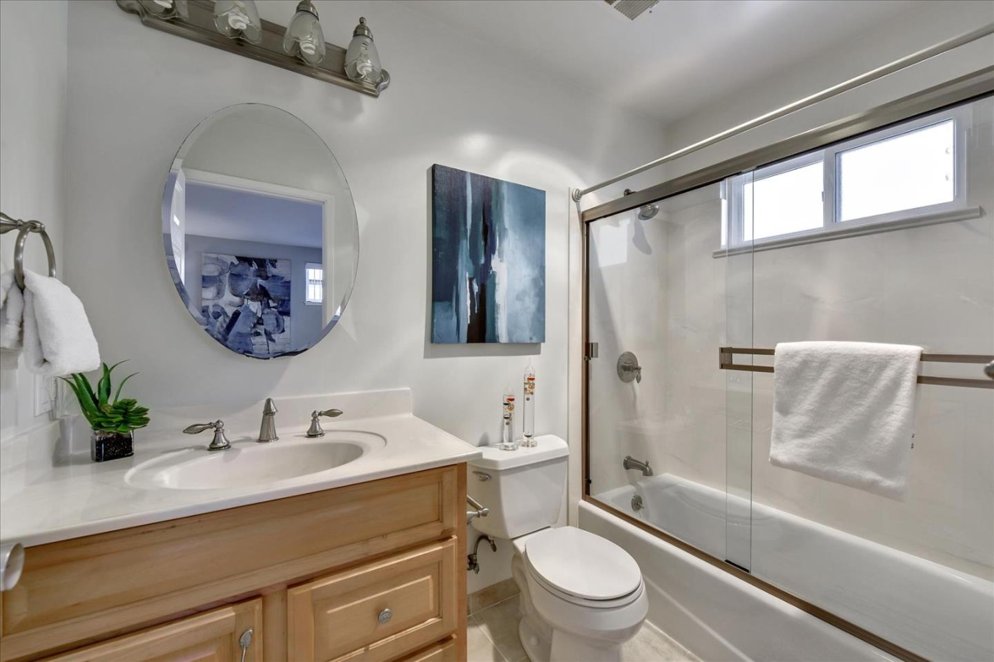 1371 Linda Mar Boulevard Pacifica, CA 94044 - Photo 17 of 30 a bathroom with a sink a toilet and a bathtub