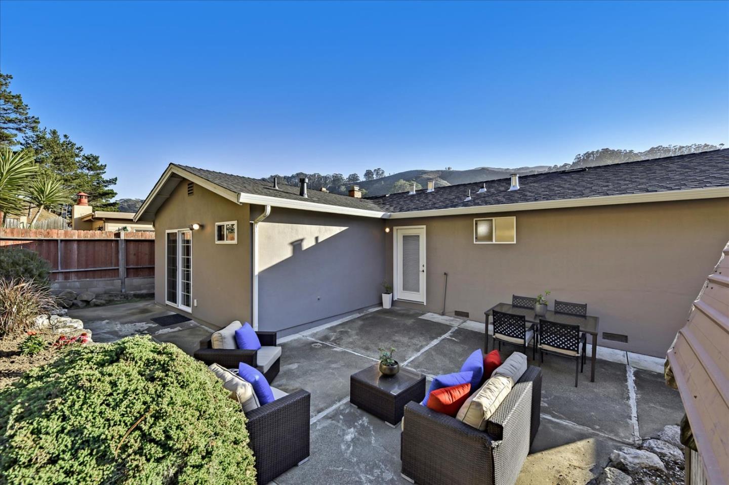 1371 Linda Mar Boulevard Pacifica, CA 94044 - Photo 27 of 30 a view of a backyard with furniture and a grill