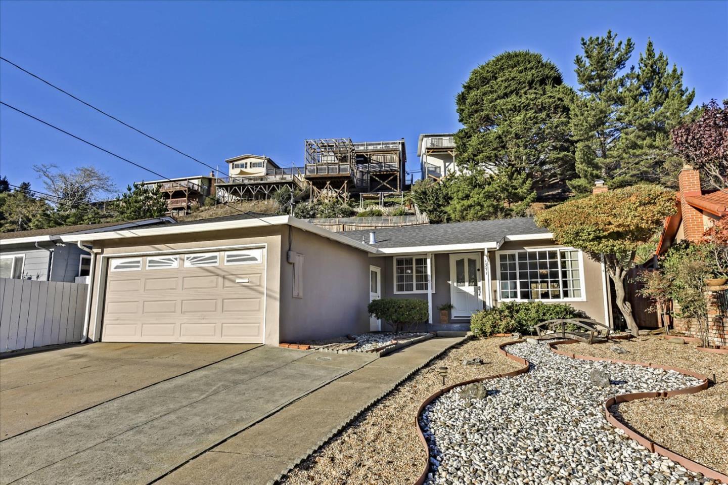 1371 Linda Mar Boulevard Pacifica, CA 94044 - Photo 28 of 30 a front view of a house with a yard