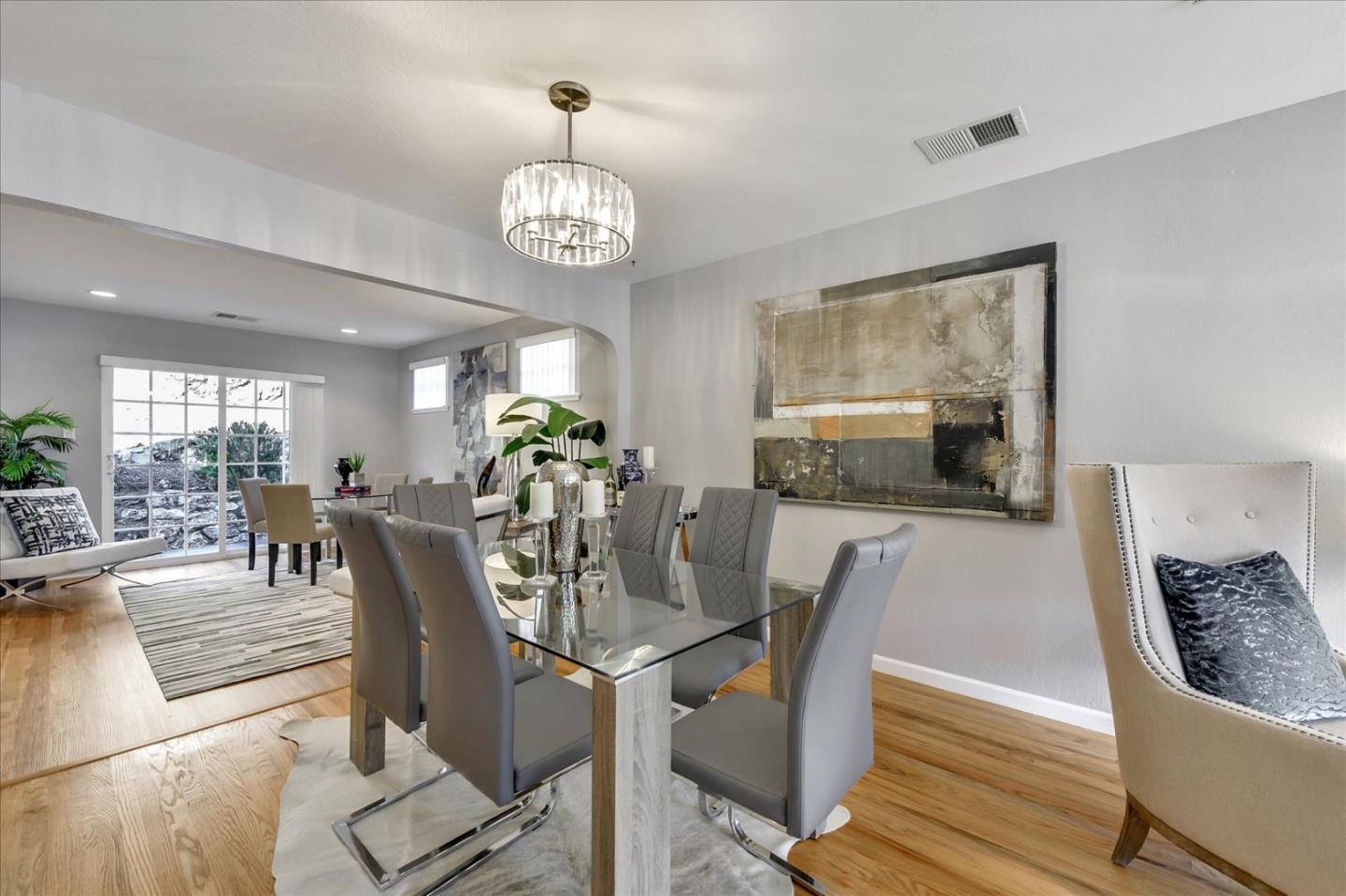 1371 Linda Mar Boulevard Pacifica, CA 94044 - Photo 7 of 30 a view of a dining room with furniture window and wooden floor