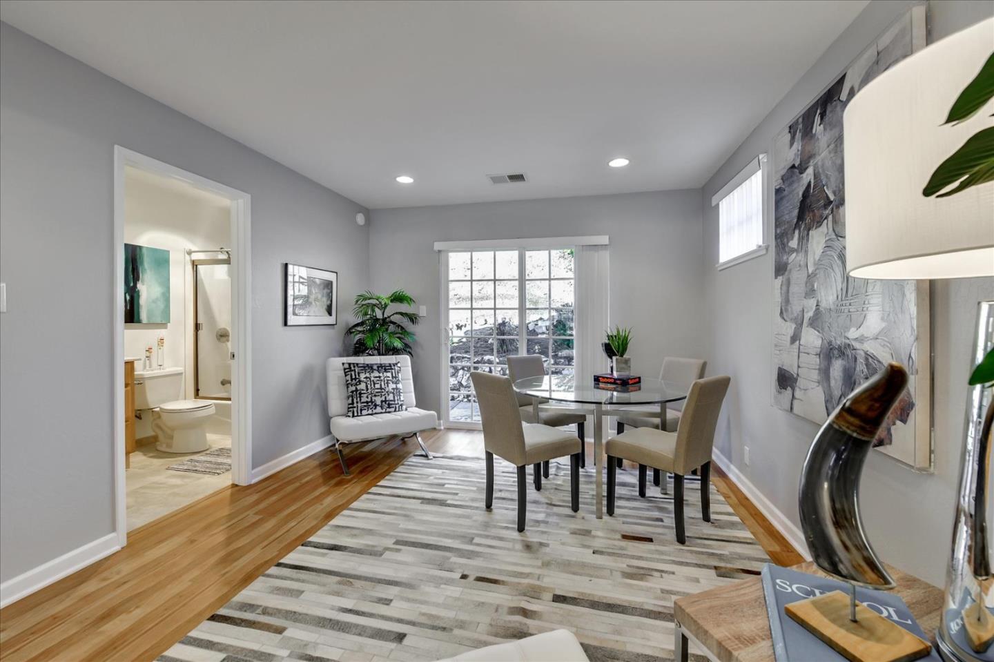 1371 Linda Mar Boulevard Pacifica, CA 94044 - Photo 8 of 30 a view of a dining room with furniture window and wooden floor