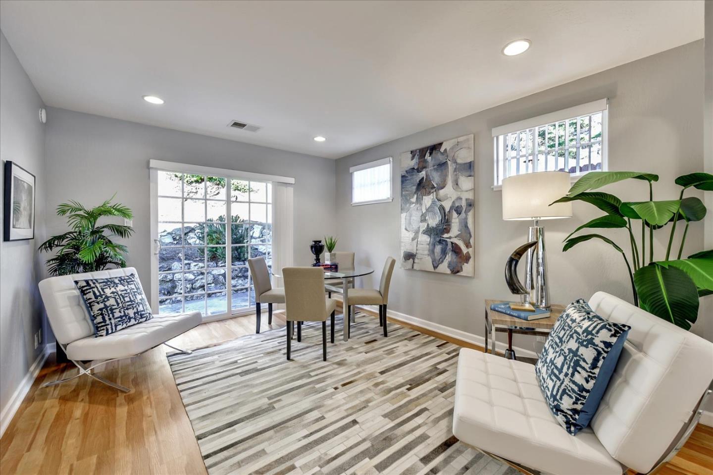 1371 Linda Mar Boulevard Pacifica, CA 94044 - Photo 9 of 30 a view of a livingroom with furniture window and wooden floor