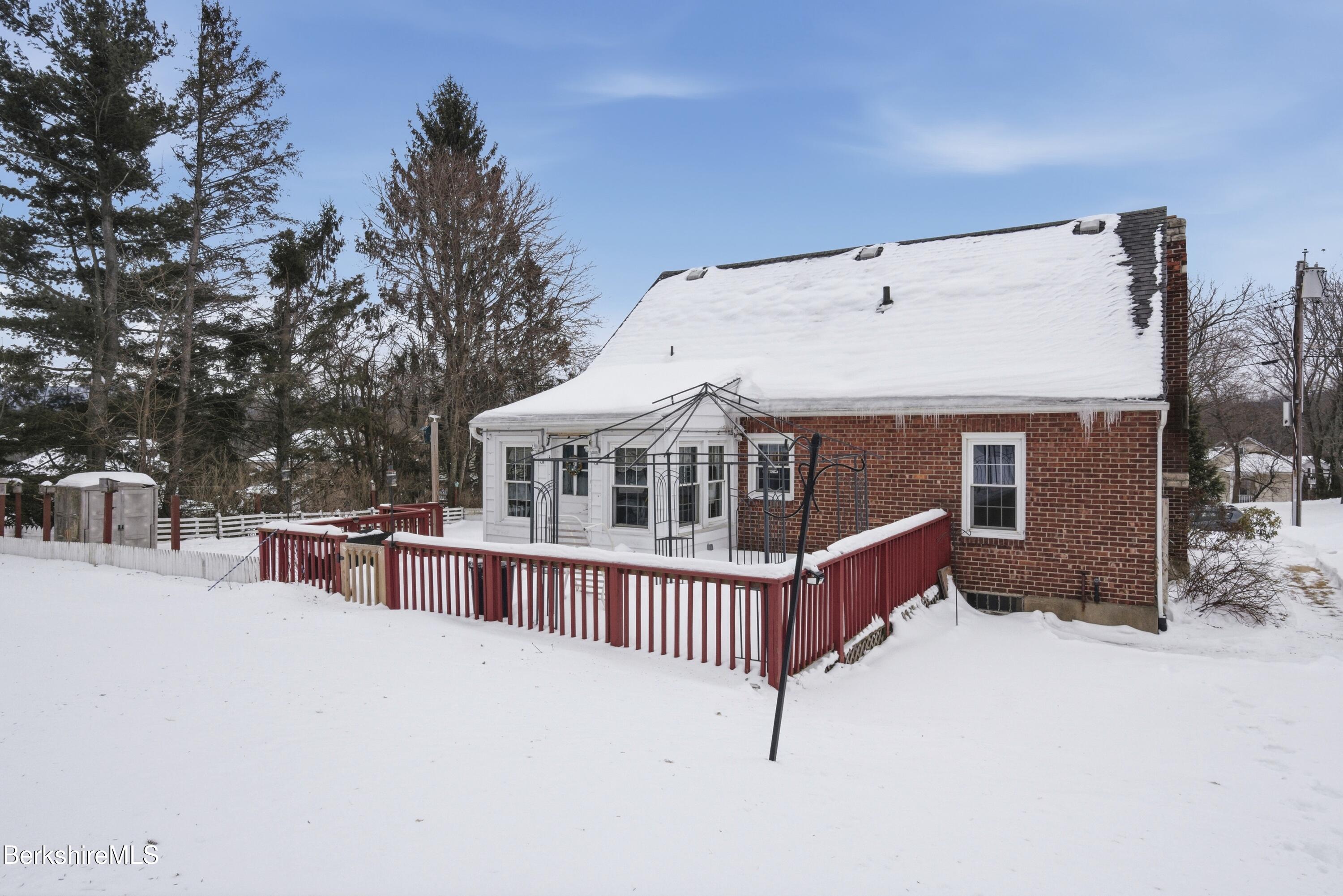 53 Edison Avenue Pittsfield, MA 01201 - Photo 41 of 45 front view of a house with a wooden deck