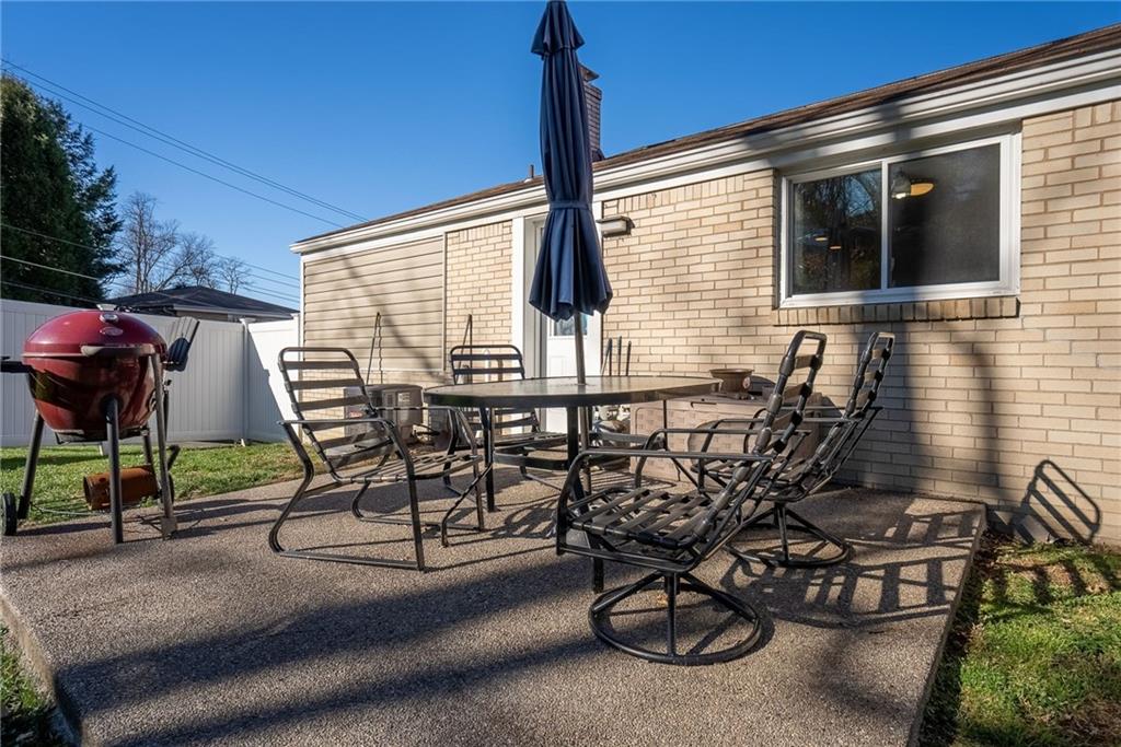 400 Pearce Road Pittsburgh, PA 15234 - Photo 27 of 31 a view of a patio with table and chairs and potted plants
