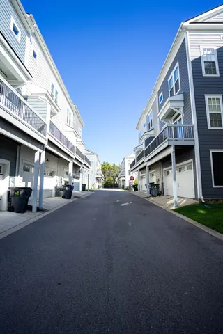 a view of swimming pool from a balcony