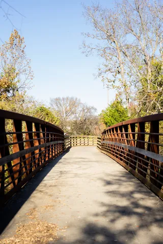 a backyard of a house with yard and outdoor seating