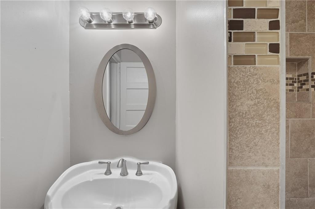 55 Wyman Street Southeast Atlanta, GA 30317 - Photo 14 of 25 a bathroom with a sink and a mirror