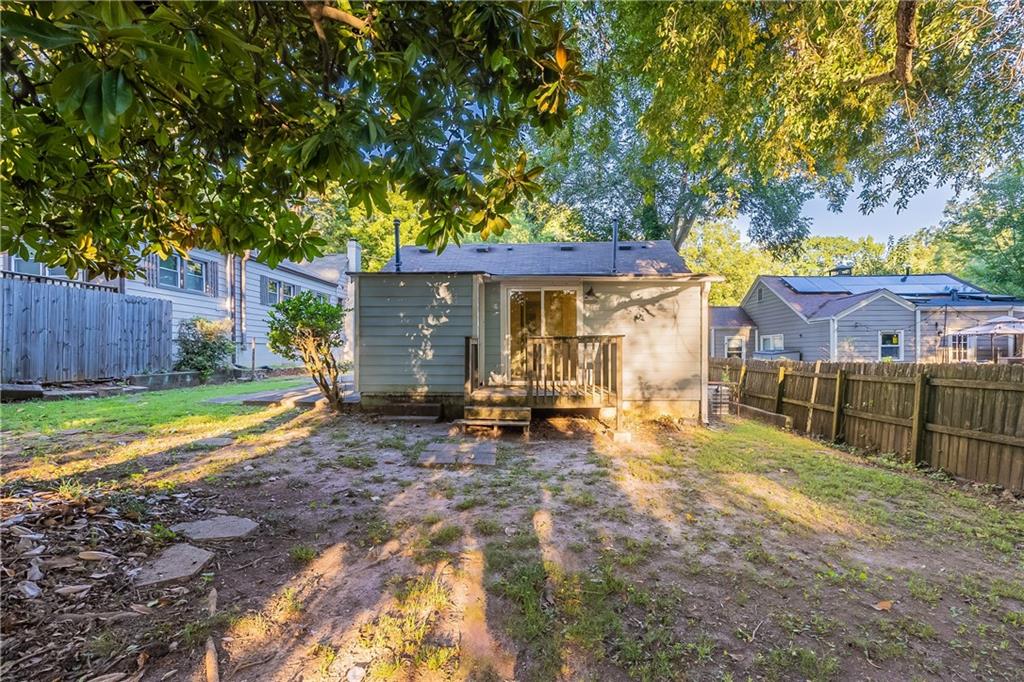 55 Wyman Street Southeast Atlanta, GA 30317 - Photo 21 of 25 a view of a house with backyard and sitting area