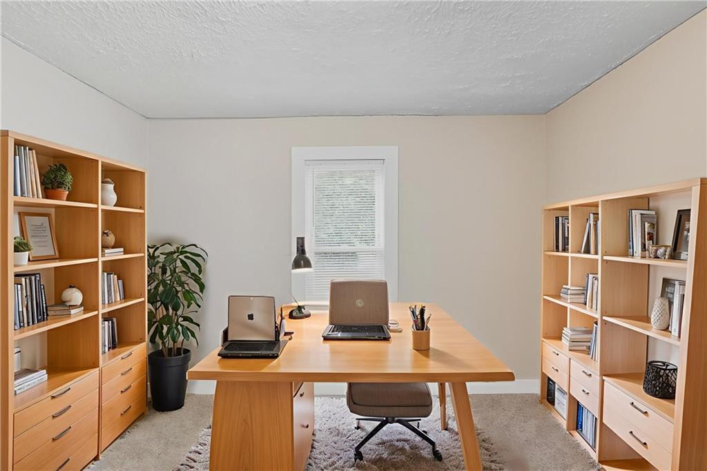 55 Wyman Street Southeast Atlanta, GA 30317 - Photo 3 of 25 a view of a workspace with furniture