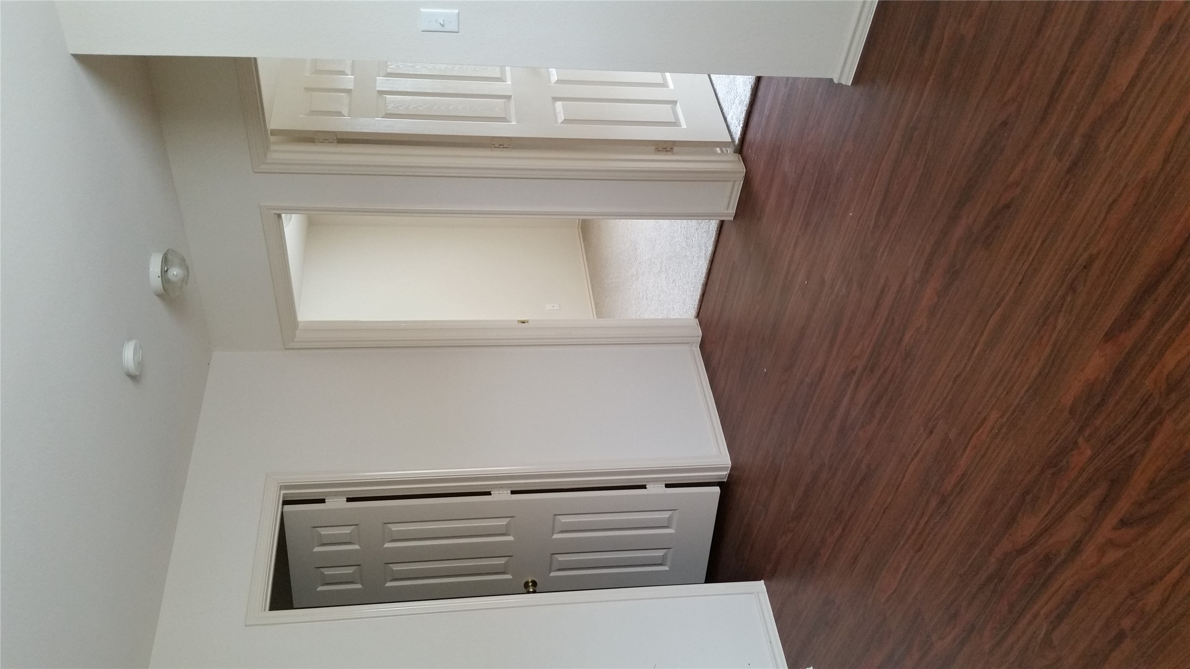 1324 Peppermint Trail Pflugerville, TX 78660 - Photo 21 of 33 Unfurnished room with dark wood finished floors and baseboards