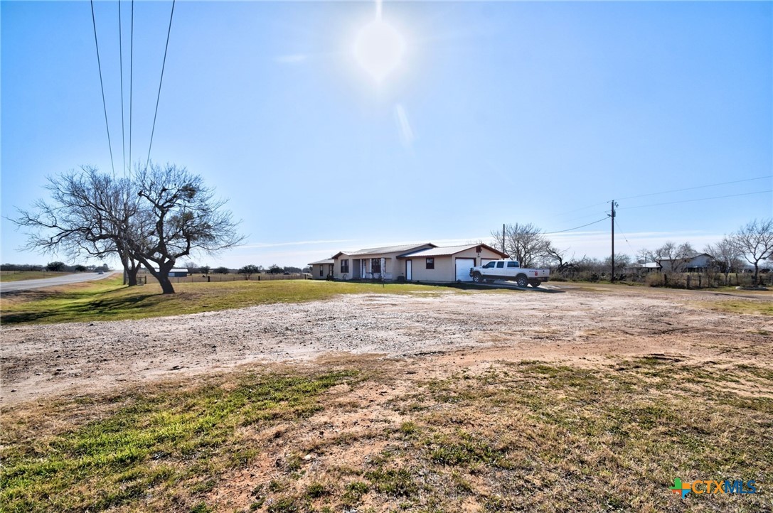 1017 Highway 87 Smiley, TX 78159 - Photo 2 of 30 a view of a swimming pool and an outdoor space