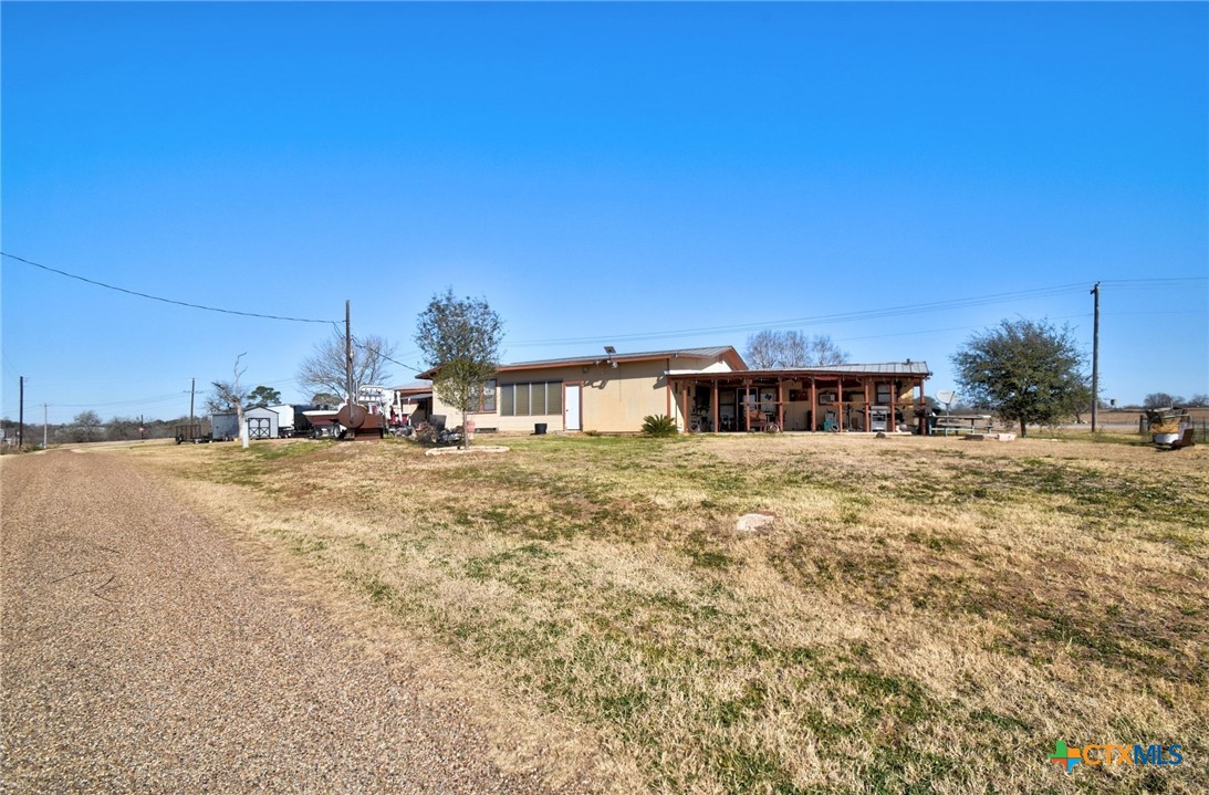 1017 Highway 87 Smiley, TX 78159 - Photo 26 of 30 a front view of a house with a yard