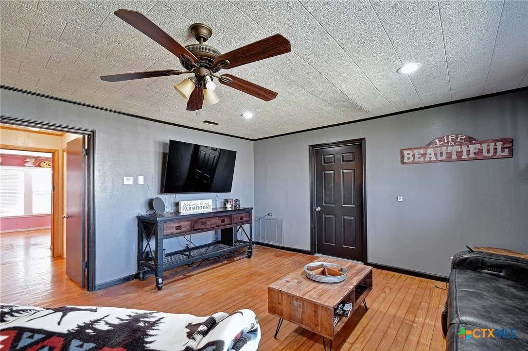 1017 Highway 87 Smiley, TX 78159 - Photo 5 of 30 a living room with furniture and a flat screen tv