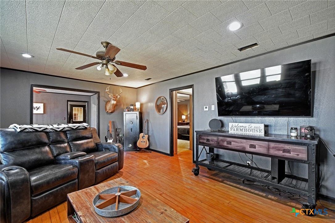 1017 Highway 87 Smiley, TX 78159 - Photo 6 of 30 a living room with furniture and a flat screen tv