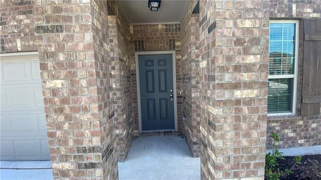 a view of a brick wall