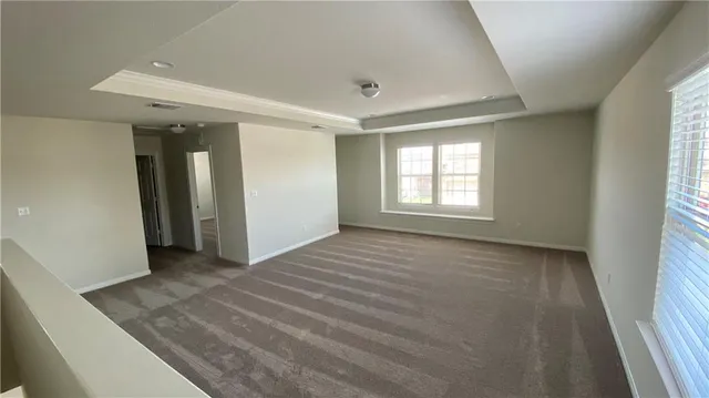 en empty room with windows