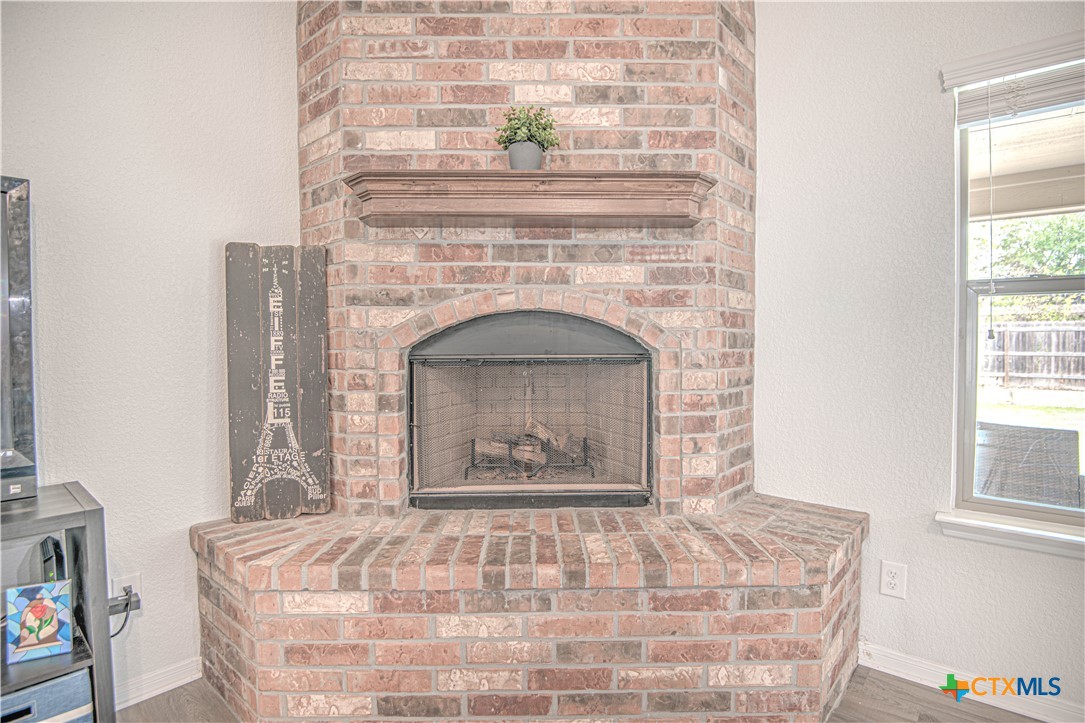 2520 Nolan Creek Street Temple, TX 76504 - Photo 10 of 32 a living room with a fireplace