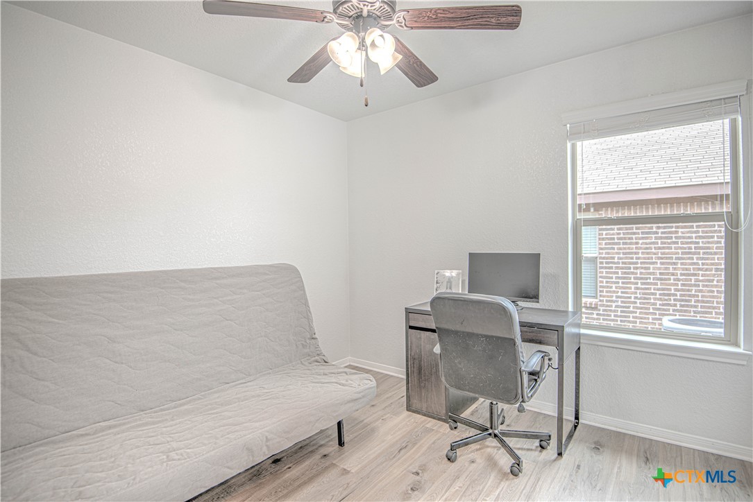 2520 Nolan Creek Street Temple, TX 76504 - Photo 24 of 32 a living room with furniture and a window