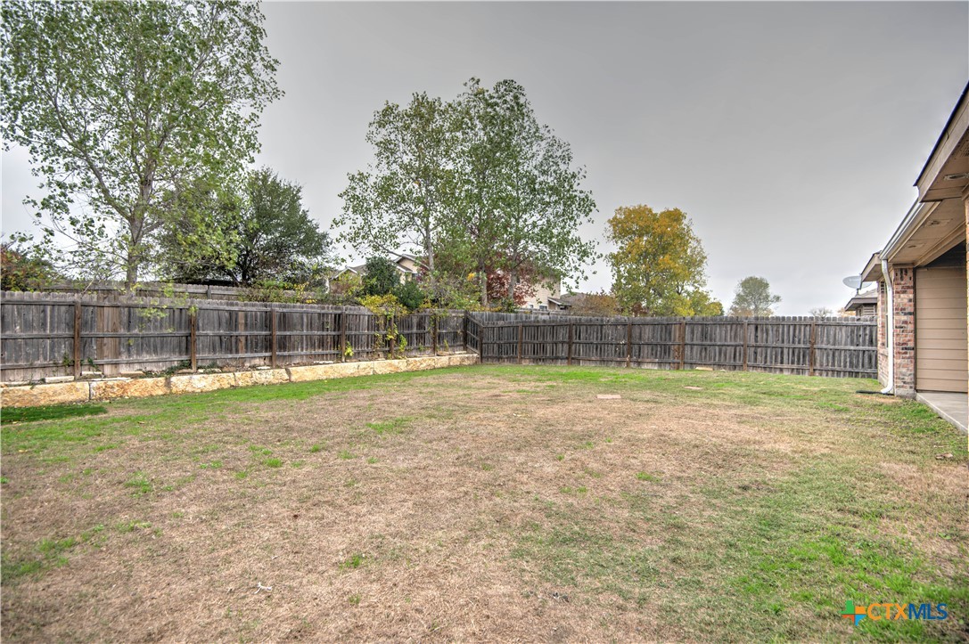 2520 Nolan Creek Street Temple, TX 76504 - Photo 29 of 32 a view of a yard with a small cabin