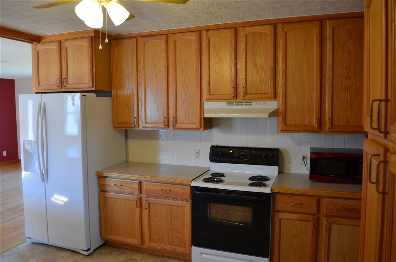 380 Mt Solon Road Mount Solon, VA 22843 - Photo 3 of 50 a kitchen with stainless steel appliances granite countertop a refrigerator a stove and a sink with cabinets