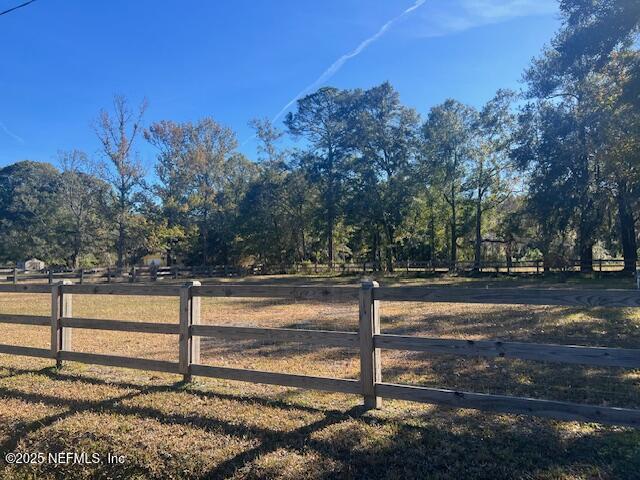 312 East Market Road Starke, FL 32091 - Photo 13 of 51 a view of a yard with trees