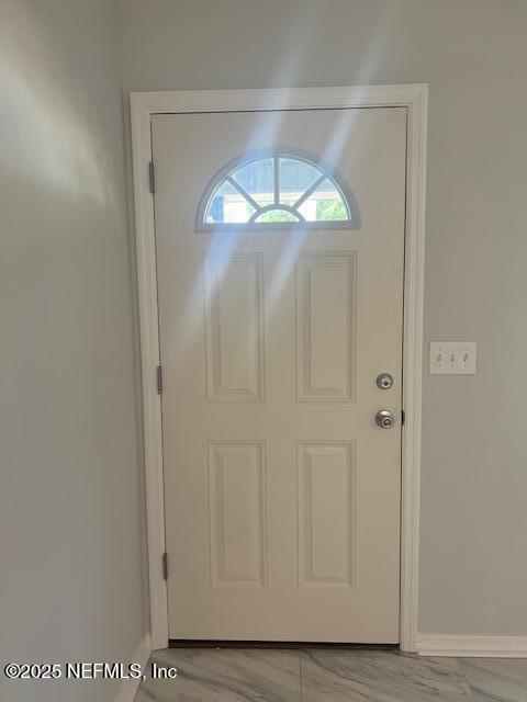 312 East Market Road Starke, FL 32091 - Photo 16 of 51 a view of front door with wooden floor