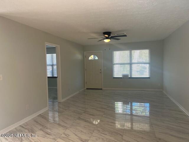312 East Market Road Starke, FL 32091 - Photo 18 of 51 an empty room with windows and closet