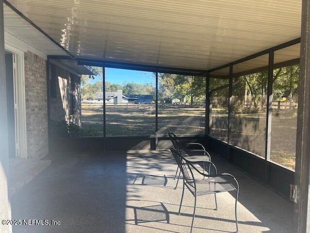 312 East Market Road Starke, FL 32091 - Photo 48 of 51 a view of a room with wooden floor and iron stairs