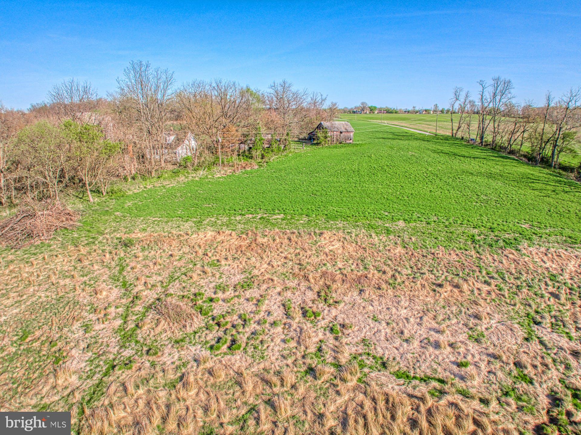 12347 Axline Road Lovettsville, VA 20180 - Photo 15 of 16 a view of a pathway both side of grassy field with shrub