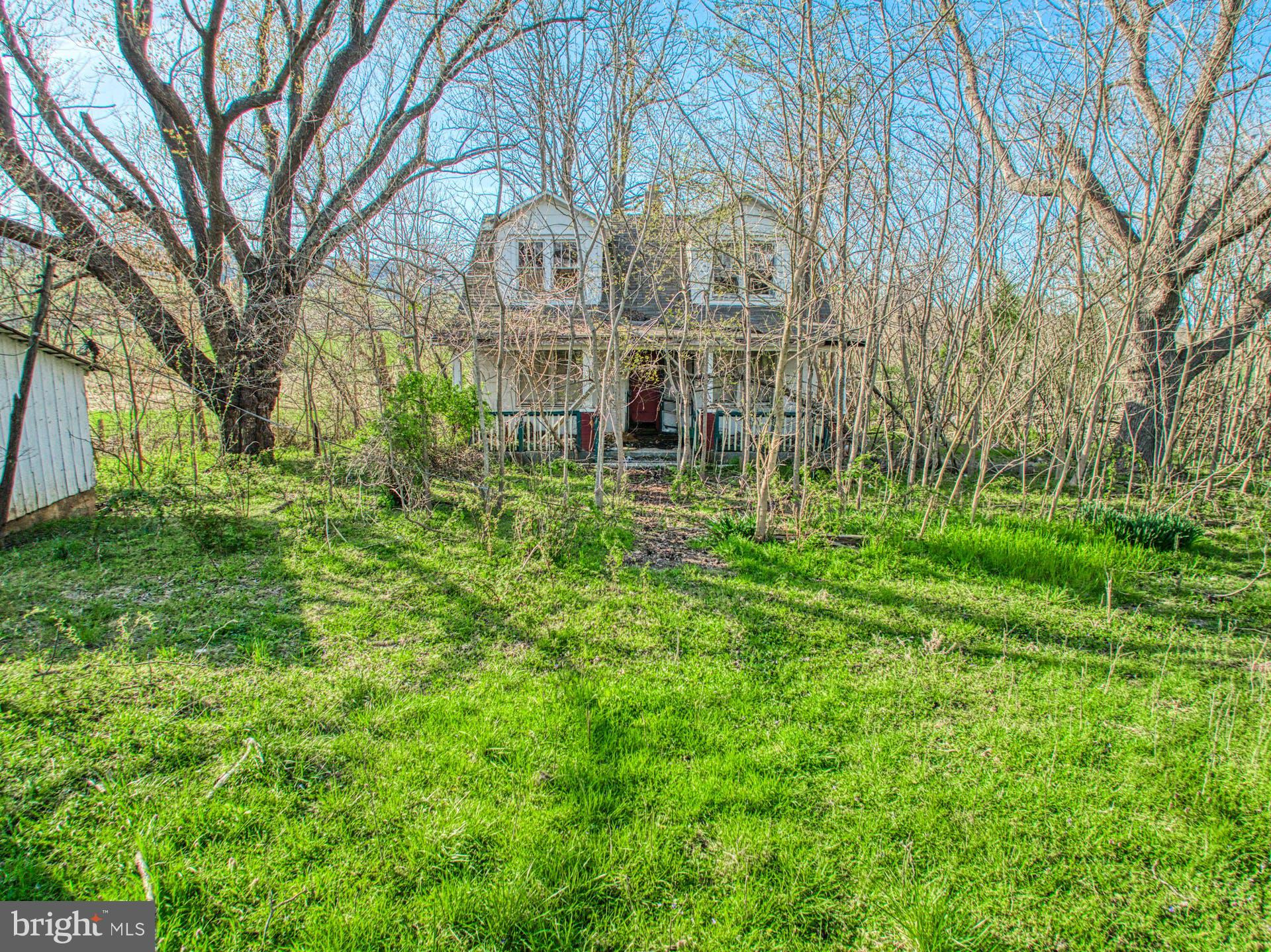 12347 Axline Road Lovettsville, VA 20180 - Photo 16 of 16 a view of a building with a yard