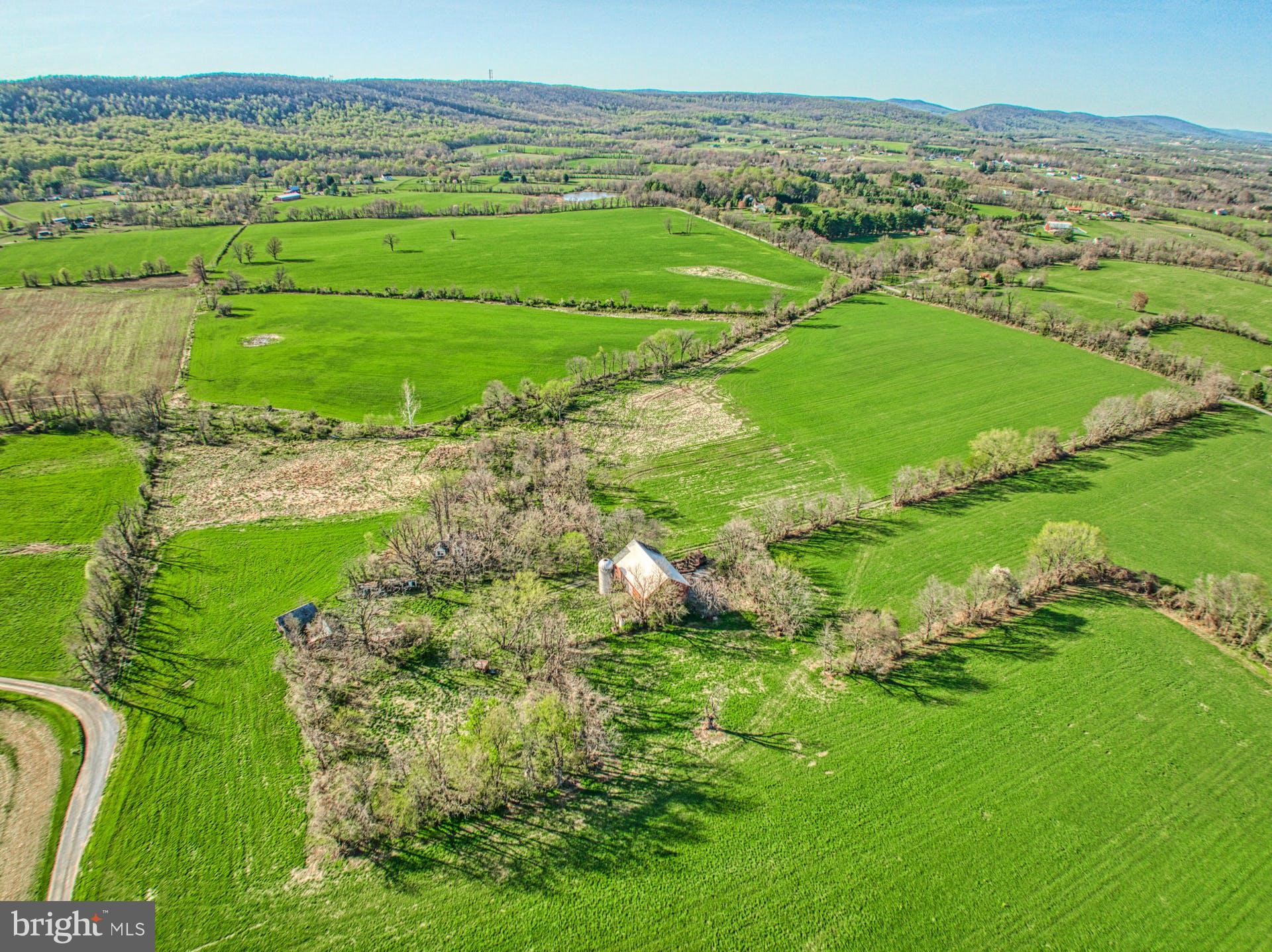 12347 Axline Road Lovettsville, VA 20180 - Photo 5 of 16 an aerial view of a houses with outdoor space and a lake view