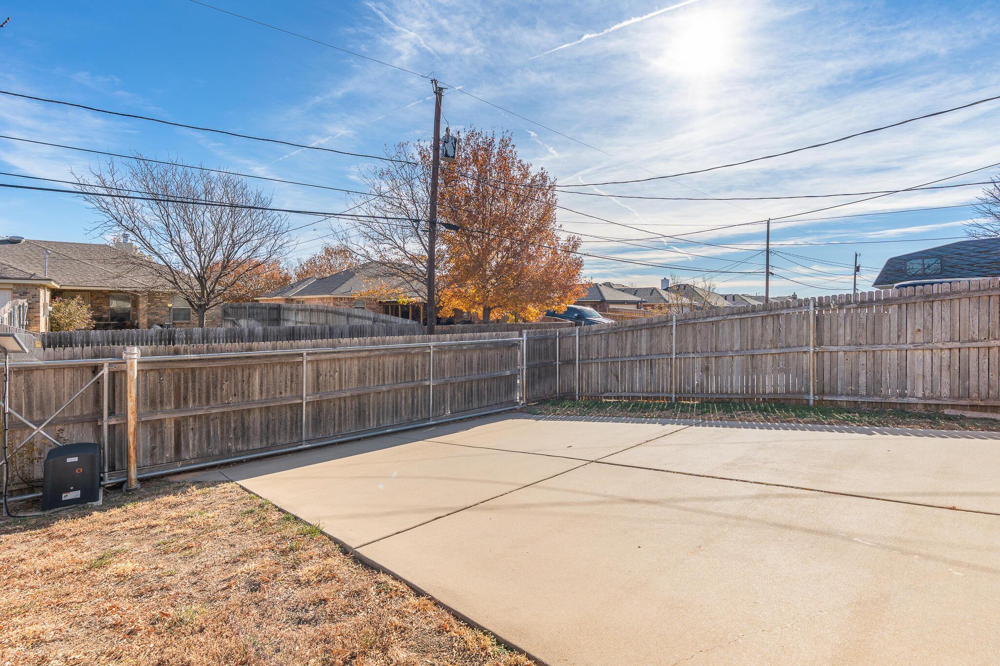 4403 Ross Street Amarillo, TX 79118 - Photo 25 of 27 a view of backyard and tree