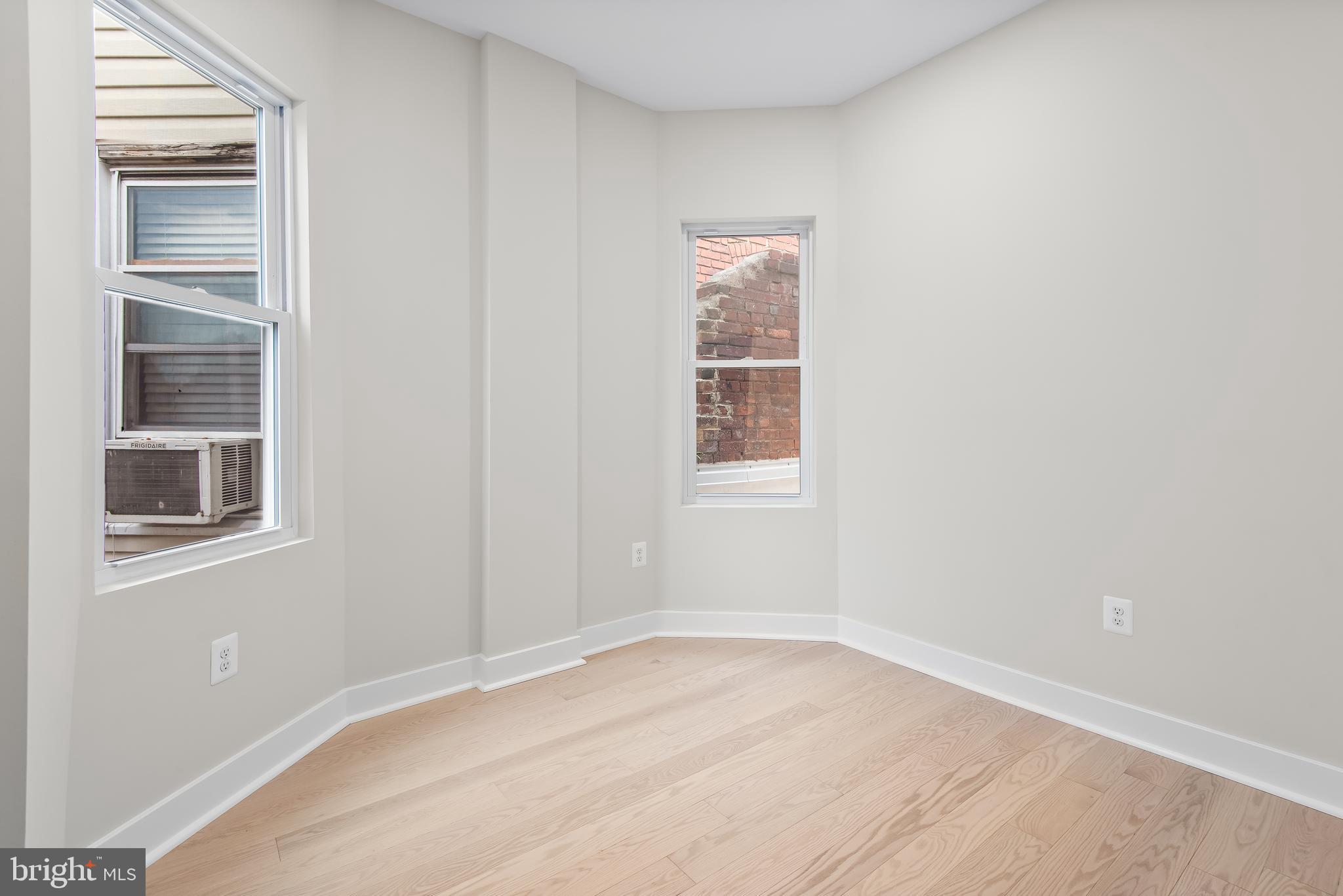 20 T Street Northwest, Unit 2 Washington, DC 20001 - Photo 26 of 31 a view of empty room with windows
