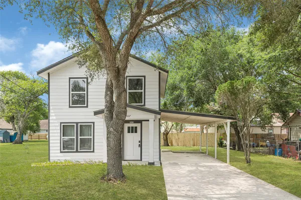 front view of a house with a yard
