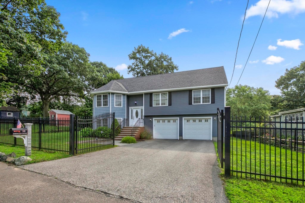 10 Emerald Court Stoneham, MA 02180 - Photo 2 of 42 a view of house with outdoor space and parking
