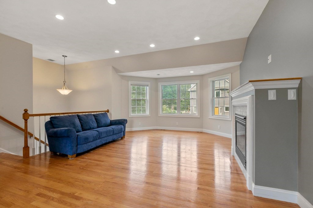 10 Emerald Court Stoneham, MA 02180 - Photo 9 of 42 a living room with furniture and a large window