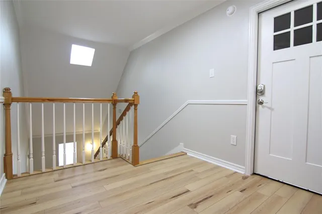 a view of a house with a yard and garage