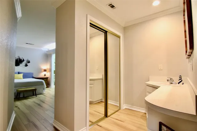 a en suite bathroom with a sink and a mirror