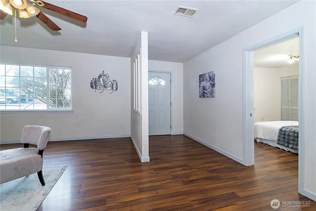 a view of an empty room and window