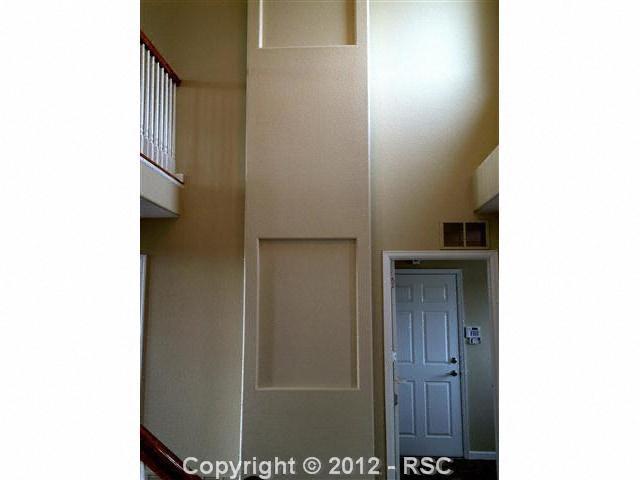9428 Rockingham Drive Peyton, CO 80831 - Photo 5 of 17 two story entry detail